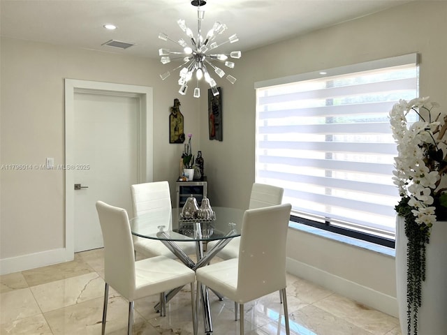 dining room featuring baseboards, marble finish floor, a notable chandelier, and visible vents