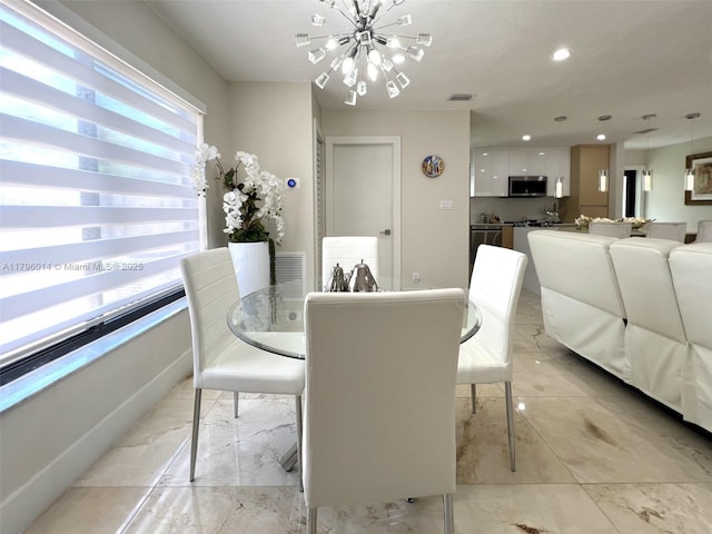 dining area with recessed lighting, a notable chandelier, and visible vents