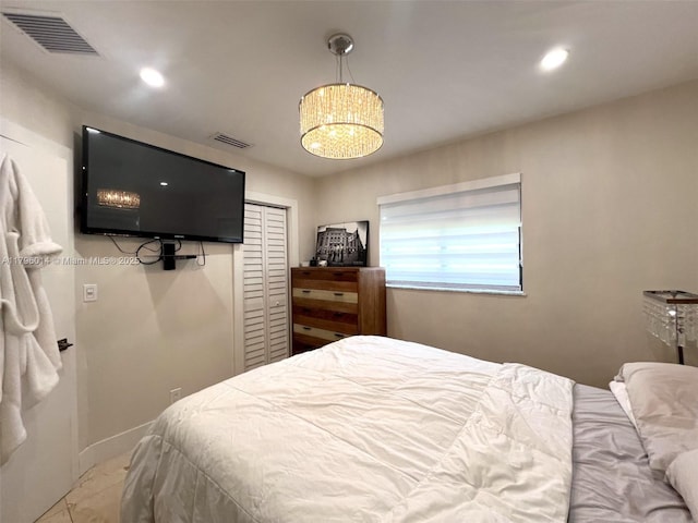 bedroom with visible vents, recessed lighting, and a notable chandelier