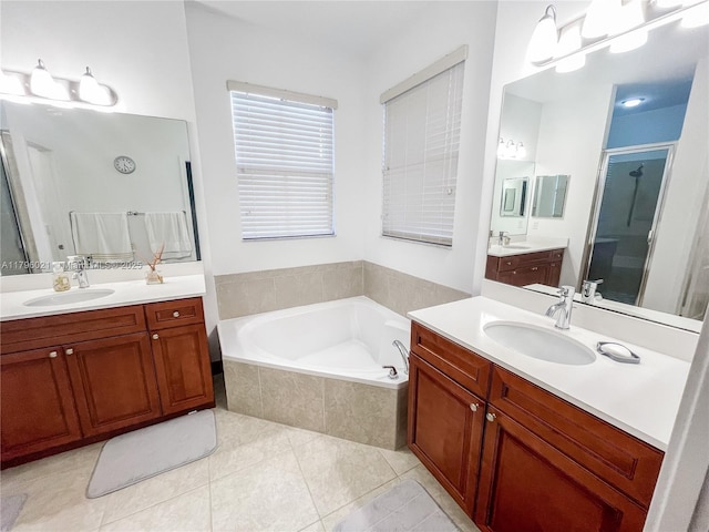 full bath featuring a sink, a bath, and a stall shower