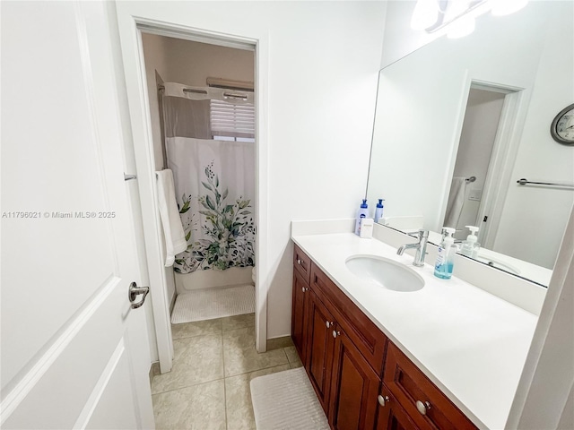 full bathroom featuring vanity, tile patterned flooring, and shower / bathtub combination with curtain