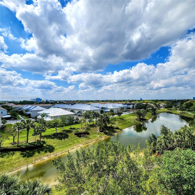aerial view featuring a residential view and a water view