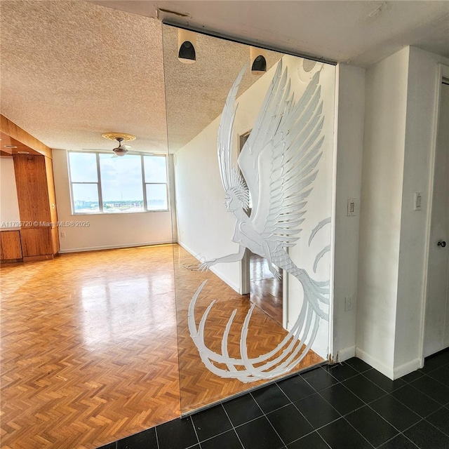 interior space featuring baseboards