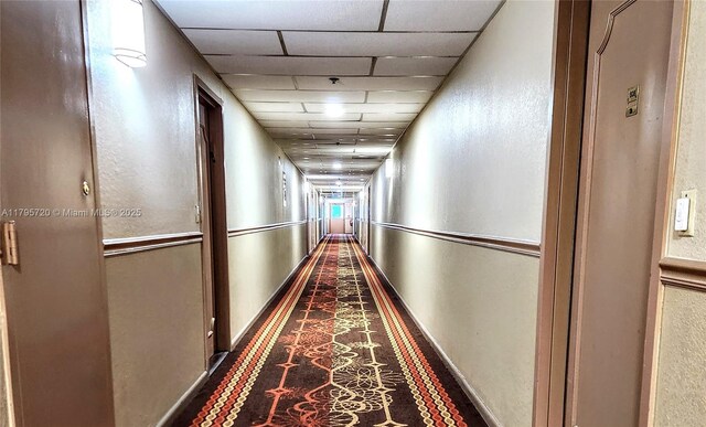 4001 Hillcrest Dr Unit 602-4, Hollywood, FL 33021 - corridor with a drop ceiling and a textured wall