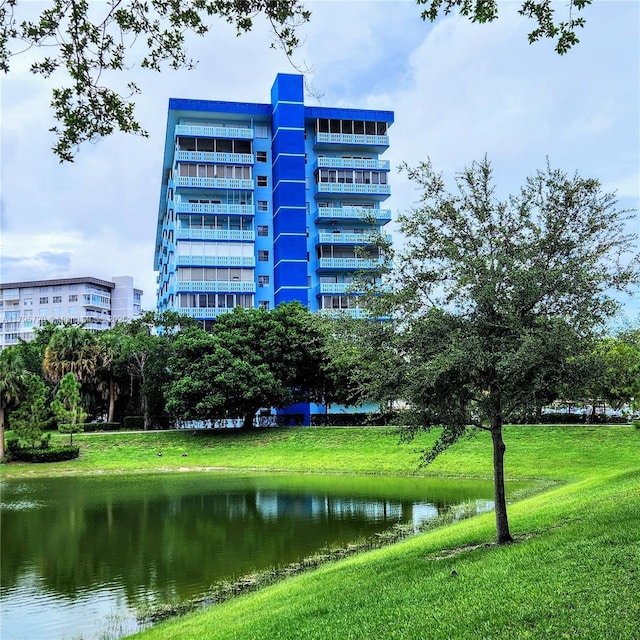 view of building exterior featuring a water view