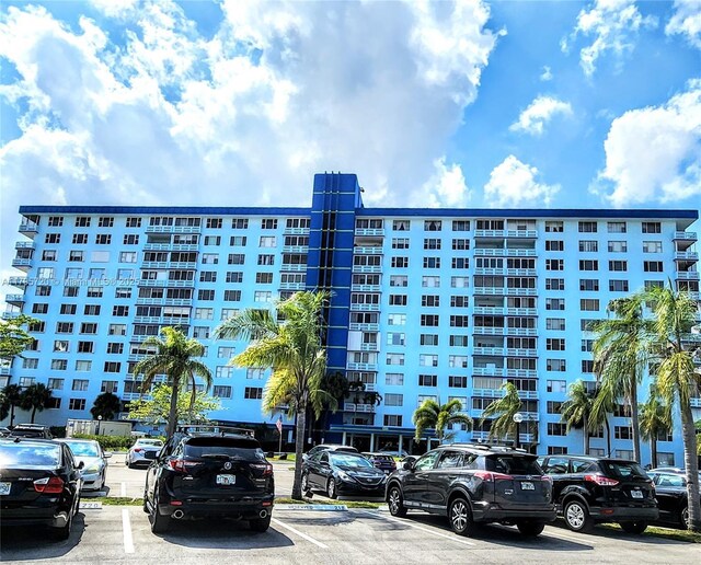 4001 Hillcrest Dr Unit 602-4, Hollywood, FL 33021 - view of apartment building / complex featuring uncovered parking