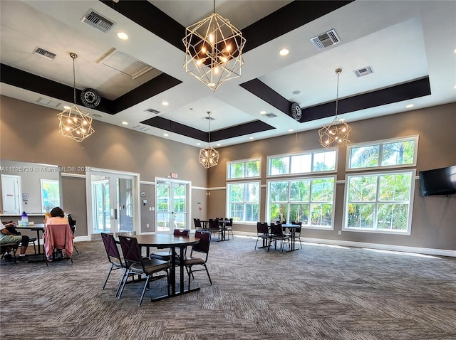 4001 Hillcrest Dr Unit 602-4, Hollywood, FL 33021 - dining space featuring a chandelier, dark colored carpet, a towering ceiling, baseboards, and recessed lighting