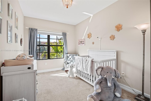 10103 Akenside Dr, Boca Raton, FL 33428 - carpeted bedroom with a crib and baseboards