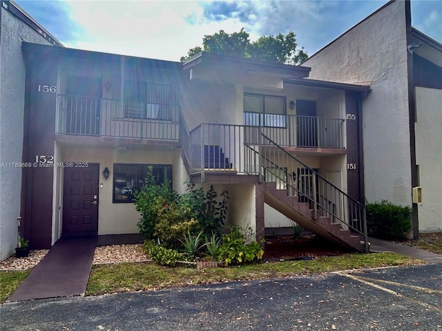 view of property with stairway