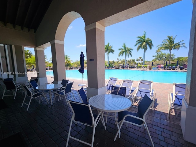 view of patio / terrace with a community pool