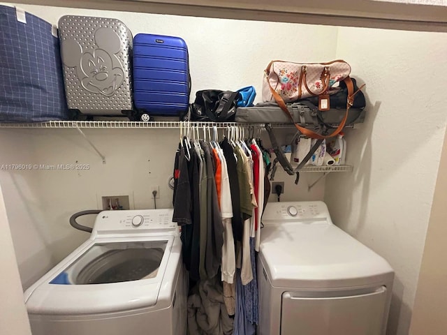 laundry area with laundry area and independent washer and dryer