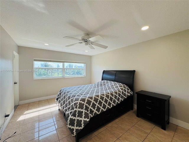 bedroom with baseboards, recessed lighting, a textured ceiling, a ceiling fan, and light tile patterned floors