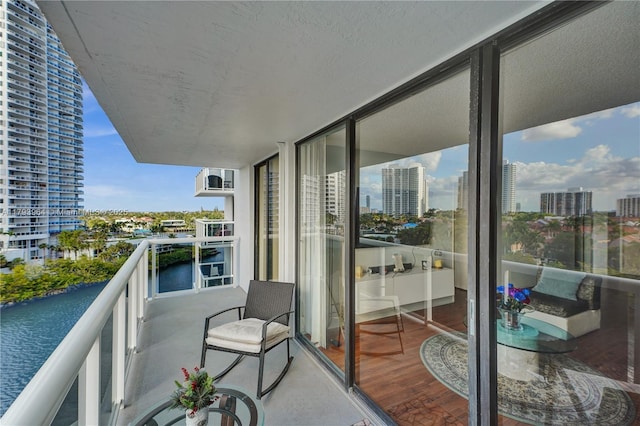 20505 E Country Club Dr Unit 732, Aventura, FL 33180 - balcony featuring a city view and a water view