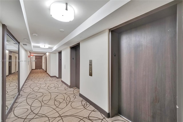 20505 E Country Club Dr Unit 732, Aventura, FL 33180 - hallway with elevator, baseboards, and light colored carpet