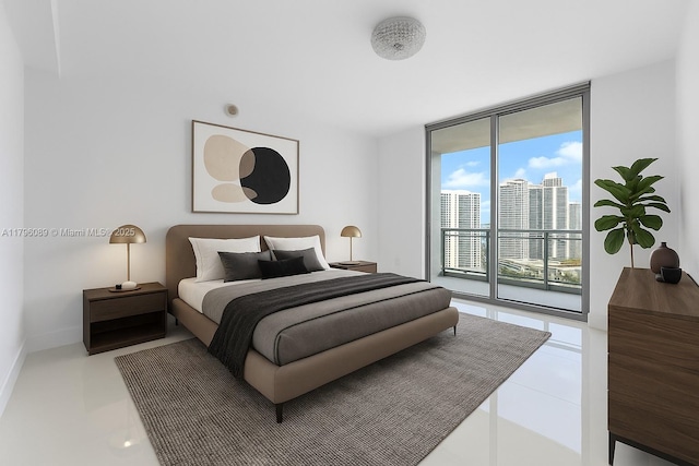 tiled bedroom featuring expansive windows, a view of city, and access to outside