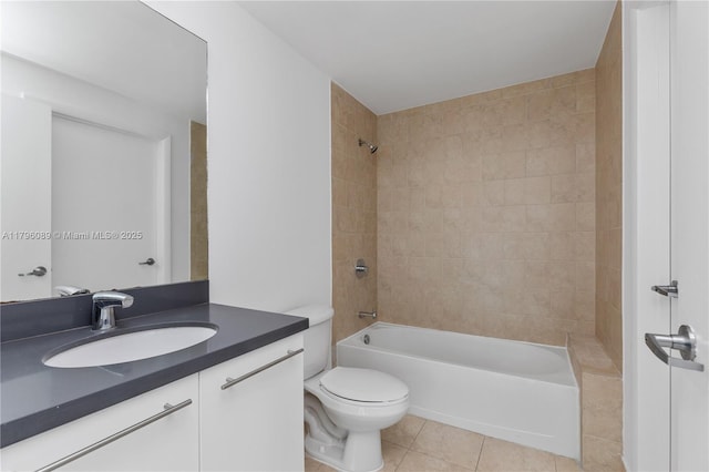 full bath with toilet,  shower combination, tile patterned flooring, and vanity