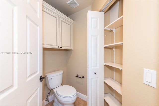 504 Bedford Ave, Weston, FL 33326 - bathroom featuring baseboards and toilet