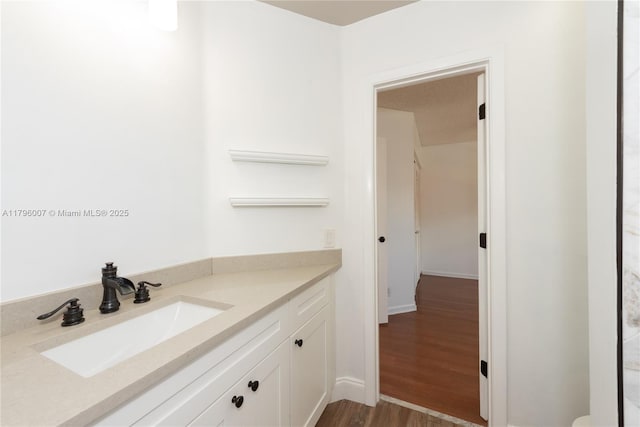 504 Bedford Ave, Weston, FL 33326 - bathroom with wood finished floors and vanity