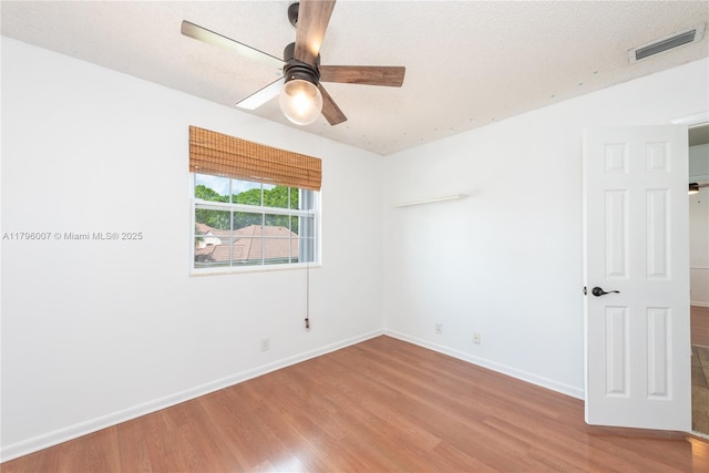 504 Bedford Ave, Weston, FL 33326 - unfurnished room featuring wood finished floors and ceiling fan