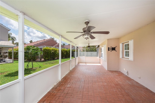 504 Bedford Ave, Weston, FL 33326 - unfurnished sunroom featuring ceiling fan and plenty of natural light