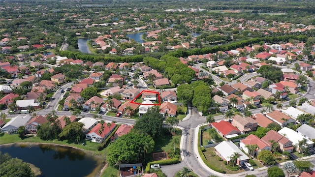 504 Bedford Ave, Weston, FL 33326 - aerial overview of property's location with a large body of water, nearby suburban area, and property boundaries highlighted