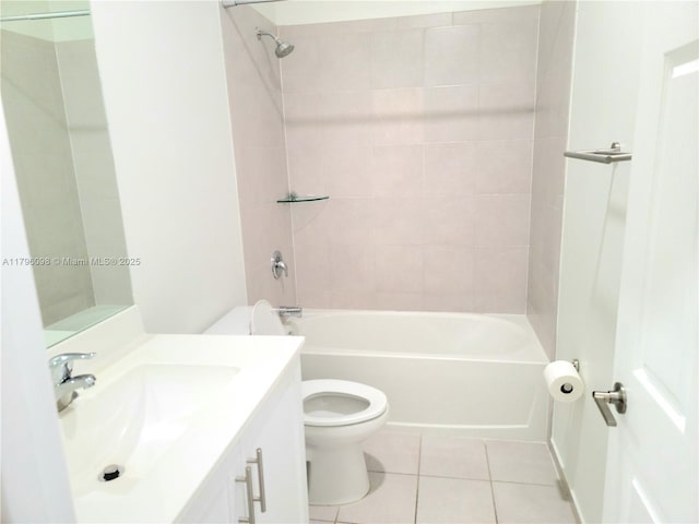full bath featuring vanity, tile patterned flooring, toilet, and shower / washtub combination