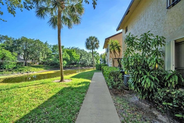view of yard with a water view