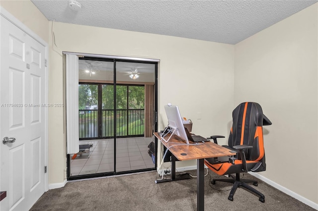 3699 Cocoplum Cir Unit 3538, Coconut Creek, FL 33063 - home office featuring carpet, baseboards, and a textured ceiling