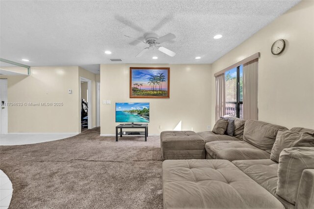 3699 Cocoplum Cir Unit 3538, Coconut Creek, FL 33063 - carpeted living room featuring ceiling fan, recessed lighting, and a textured ceiling