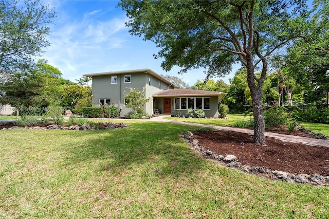 10265 SW 134th St, Miami, FL 33176 - view of front facade featuring stucco siding and a front yard