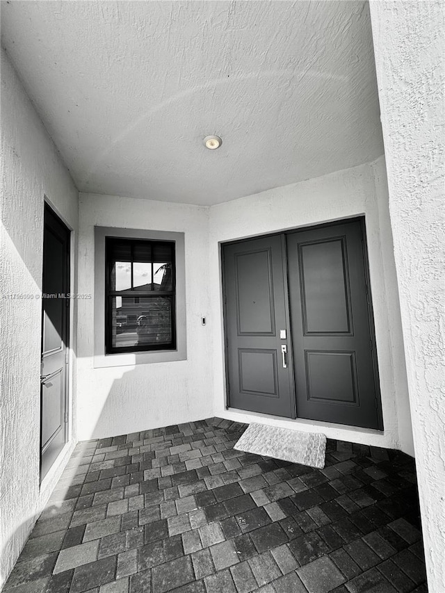 4409 SW 173rd Ave, Miramar, FL 33029 - doorway to property featuring stucco siding