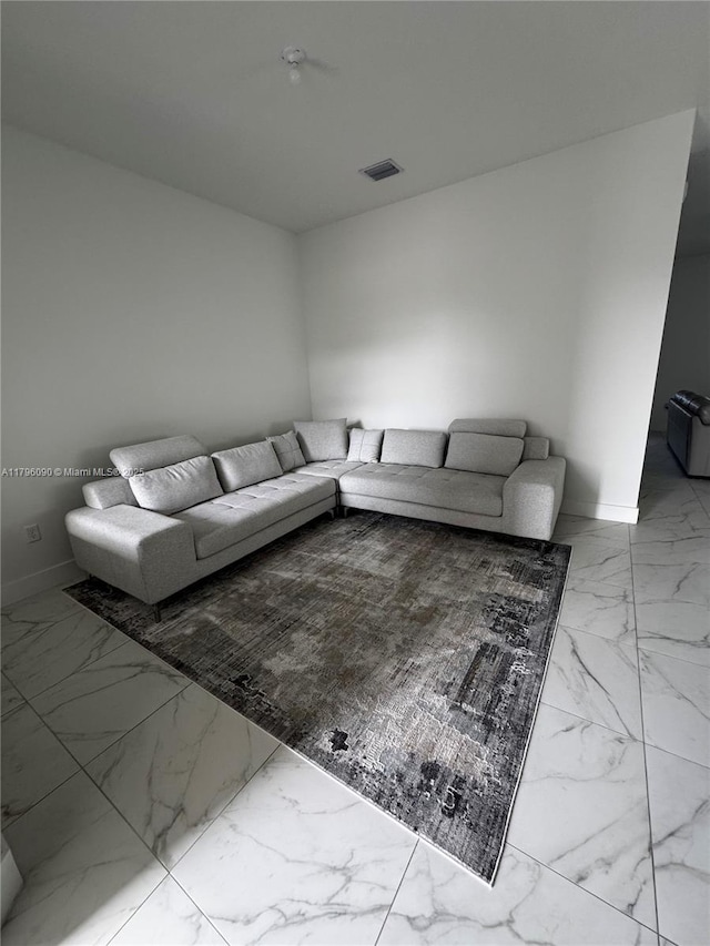 4409 SW 173rd Ave, Miramar, FL 33029 - living area with marble finish flooring and baseboards