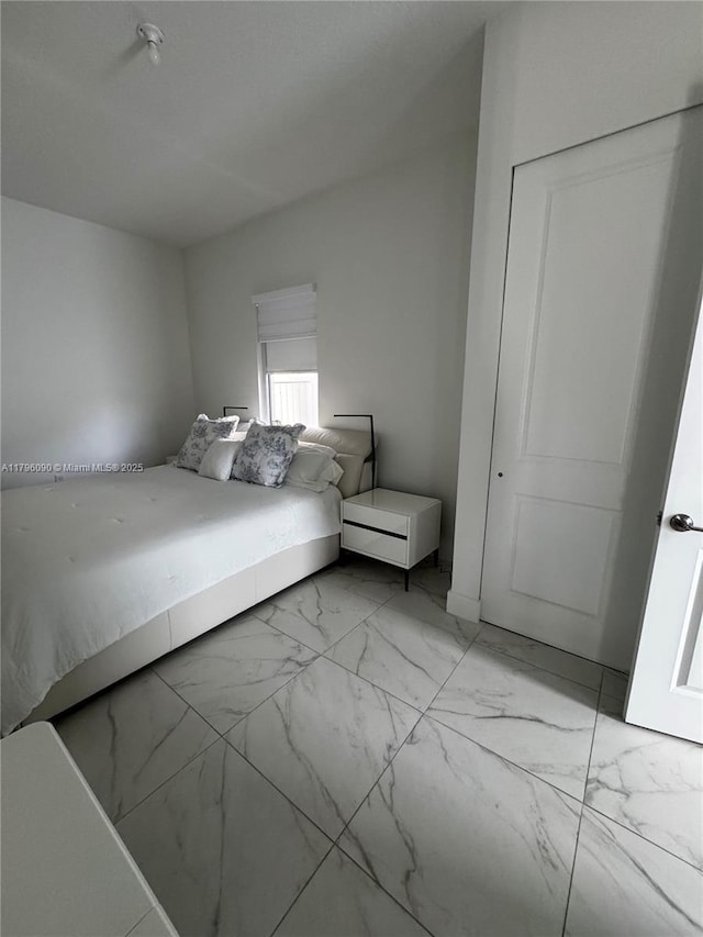 4409 SW 173rd Ave, Miramar, FL 33029 - bedroom with light marble finish flooring