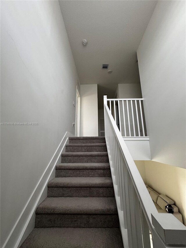 4409 SW 173rd Ave, Miramar, FL 33029 - staircase with baseboards