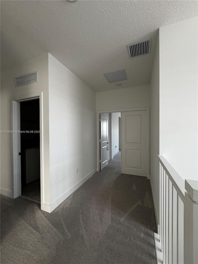 4409 SW 173rd Ave, Miramar, FL 33029 - corridor featuring carpet, baseboards, and a textured ceiling