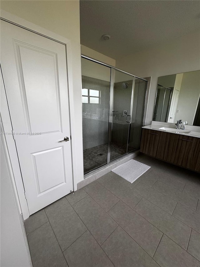 4409 SW 173rd Ave, Miramar, FL 33029 - bathroom with a shower stall, vanity, and tile patterned flooring