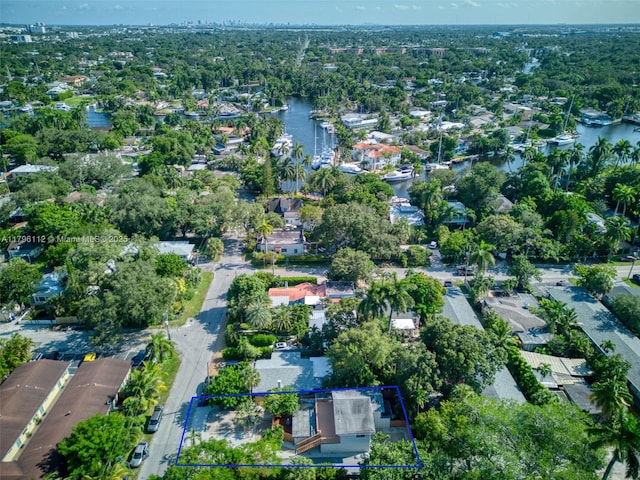 birds eye view of property featuring a residential view and a water view