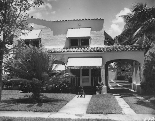 1229 Sorolla Ave, Coral Gables, FL 33134 - view of front of house with a tiled roof and stucco siding