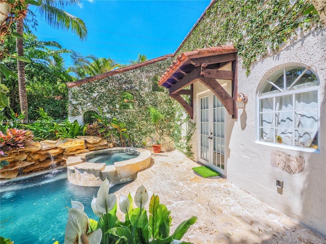 1229 Sorolla Ave, Coral Gables, FL 33134 - exterior space with french doors, a patio, and a pool with connected hot tub