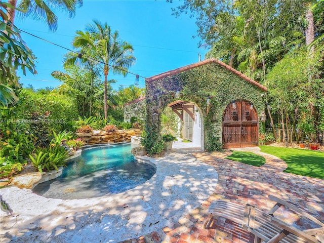 1229 Sorolla Ave, Coral Gables, FL 33134 - swimming pool with a patio area