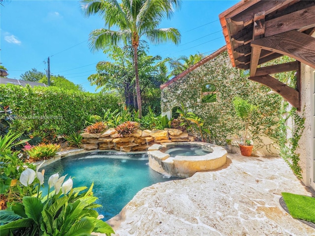 1229 Sorolla Ave, Coral Gables, FL 33134 - view of pool with a pool with connected hot tub