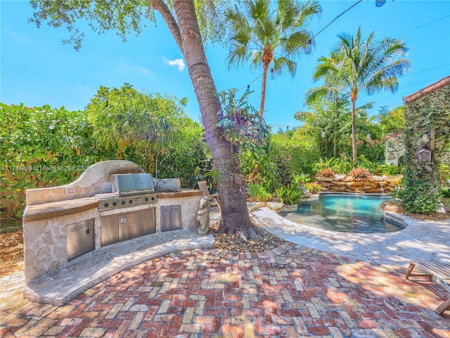 1229 Sorolla Ave, Coral Gables, FL 33134 - view of patio / terrace featuring an outdoor kitchen, grilling area, and an outdoor pool