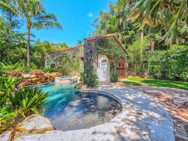 1229 Sorolla Ave, Coral Gables, FL 33134 - view of pool with a pool with connected hot tub