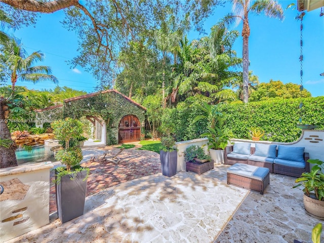 1229 Sorolla Ave, Coral Gables, FL 33134 - view of patio with outdoor lounge area