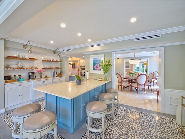 1229 Sorolla Ave, Coral Gables, FL 33134 - bar featuring crown molding, wainscoting, recessed lighting, and backsplash