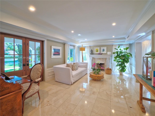 1229 Sorolla Ave, Coral Gables, FL 33134 - living room featuring french doors, ornamental molding, light marble finish flooring, a high end fireplace, and recessed lighting