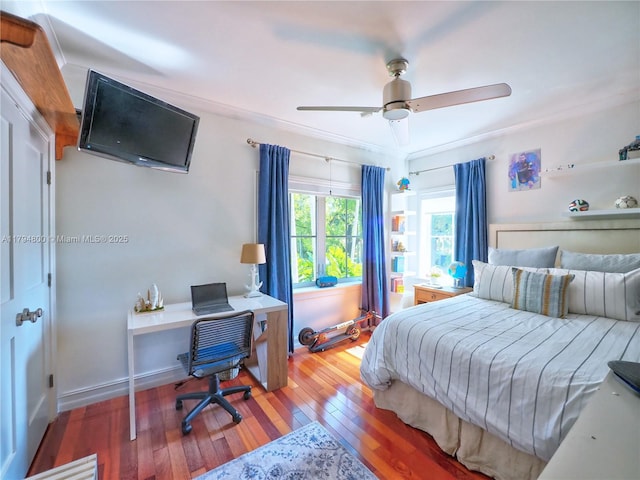 1229 Sorolla Ave, Coral Gables, FL 33134 - bedroom with hardwood / wood-style floors, an office area, crown molding, and ceiling fan