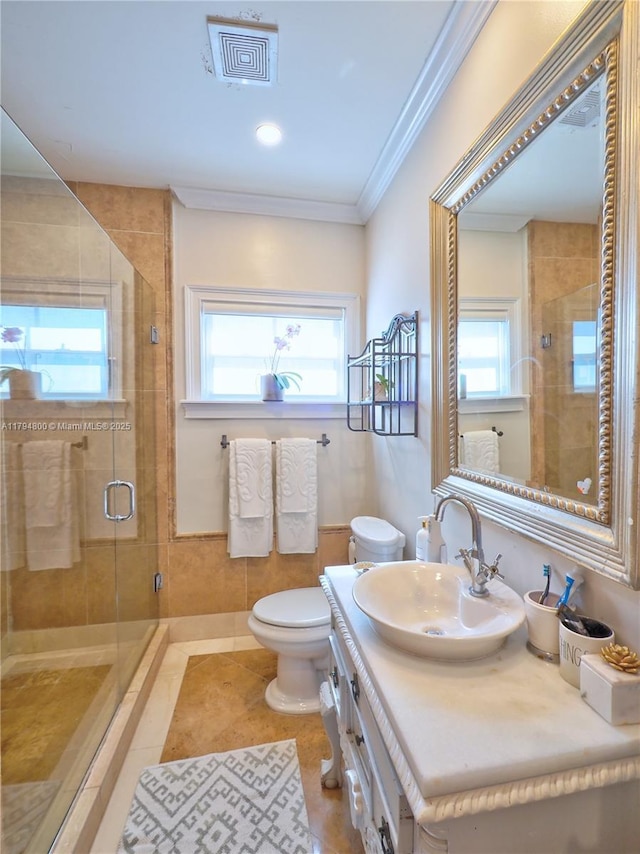 1229 Sorolla Ave, Coral Gables, FL 33134 - bathroom with ornamental molding, toilet, a stall shower, vanity, and tile patterned floors