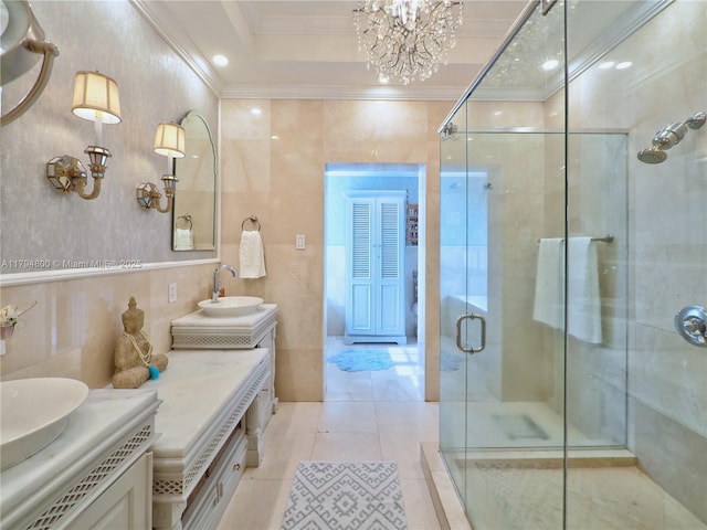 1229 Sorolla Ave, Coral Gables, FL 33134 - bathroom featuring crown molding, vanity, a stall shower, tile walls, and a chandelier