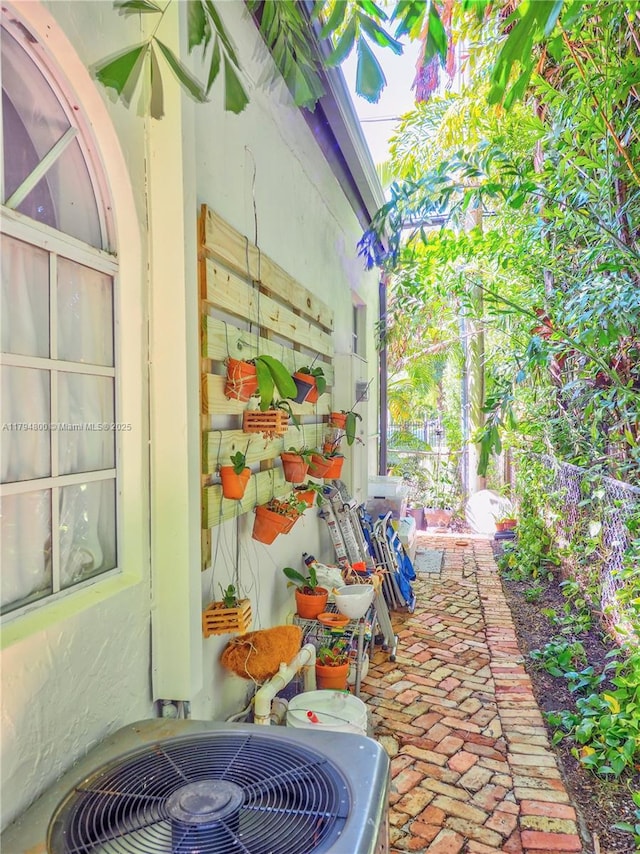 1229 Sorolla Ave, Coral Gables, FL 33134 - view of patio / terrace with central AC unit